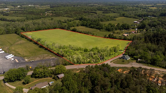 Land with lines added to denote property lines.